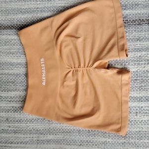 Alphalete amplify shorts cheeky coral xs